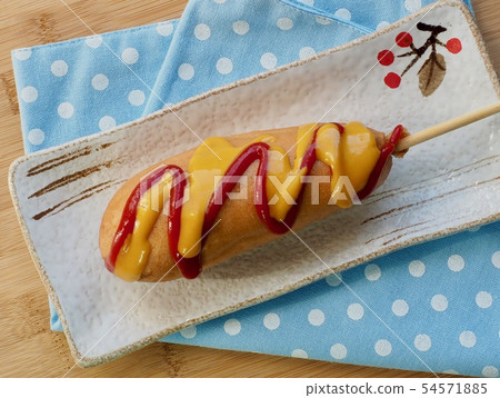 Hot dogs, ketchup, mustard sauce Hot dogs, ketchup, mustard sauce 54571885