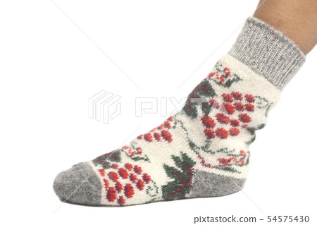 Wool sock on woman's feet isolated on white 54575430