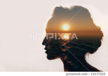 Psychology concept. Sunrise and woman silhouette. 54577826
