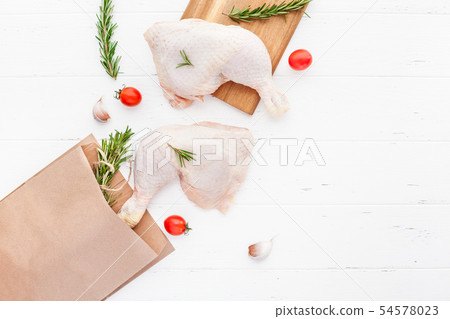 Fresh raw chicken legs with herbs. Cooking concept Fresh raw chicken legs with herbs. Cooking concept 54578023