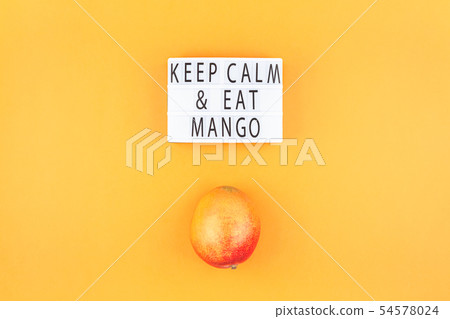 Mango fruit in creative composition 54578024