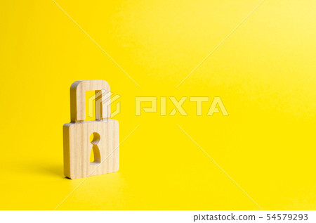 A padlock on a yellow background. A padlock on a yellow background. 54579293
