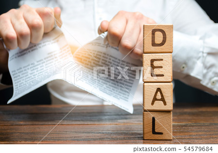 The word deal and businessman is breaking  54579684