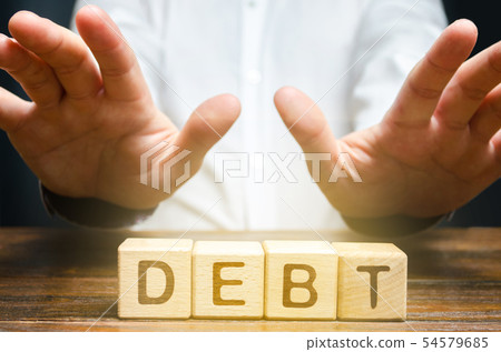 A businessman is fenced off from debt.  54579685