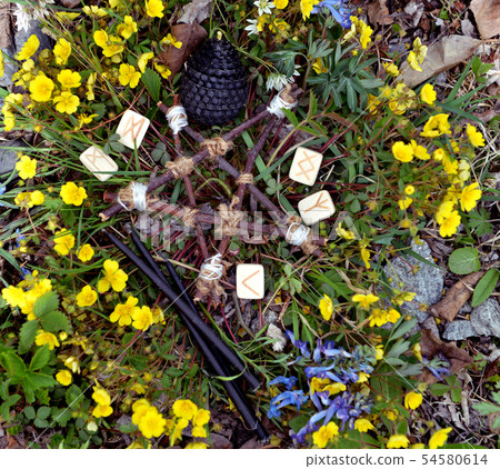 Wooden pentagram, runes and black candles  54580614