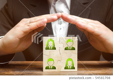 Businessman covers with hands the business  54581708
