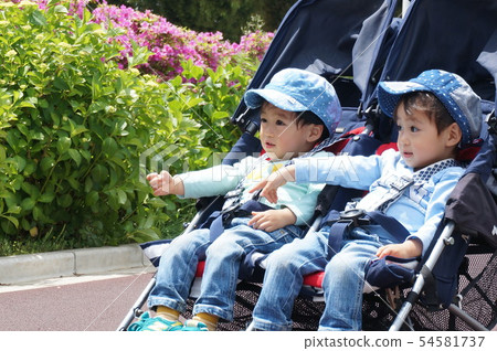 Take a stroll with your twin stroller Take a stroll with your twin stroller 54581737