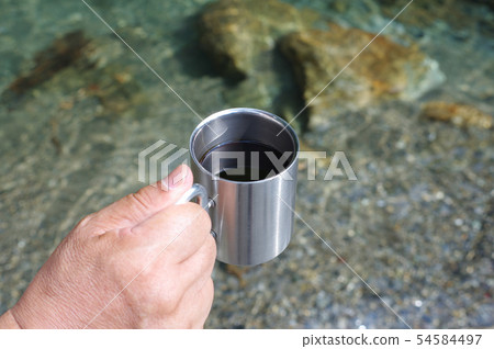 Coffee at mountain stream 54584497