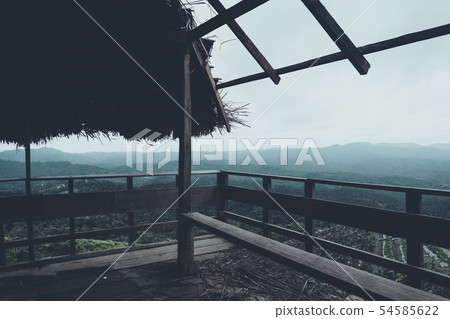Mountain and village views and fields in the rainy Mountain and village views and fields in the rainy 54585622