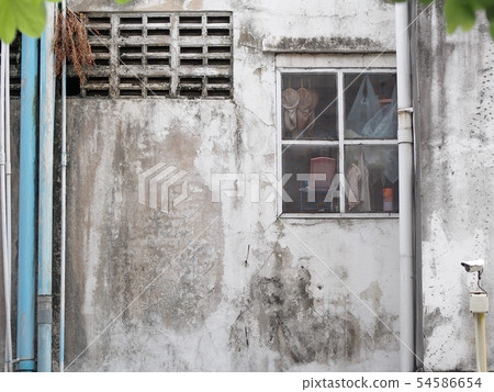 weathered grunge roadside concrete apartment wall  54586654