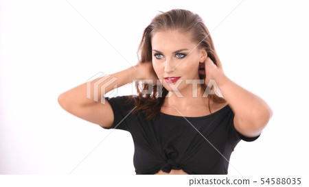 Holiday Concept. The young woman is dancing to the Holiday Concept. The young woman is dancing to the 54588035