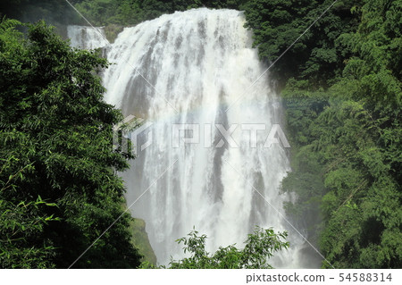 Longmen waterfall, which has a large amount of water on the day after heavy rain 54588314