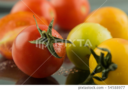 Tomato Queen, also known as Cherry tomato, is scie Tomato Queen, also known as Cherry tomato, is scie 54588977