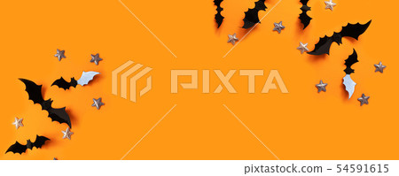Halloween flat lay composition of black paper bats 54591615