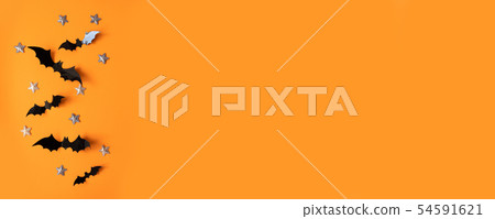 Halloween flat lay composition of black paper bats 54591621