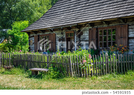 Open-air museum in Chorzow. Wooden cottage in heri 54591935