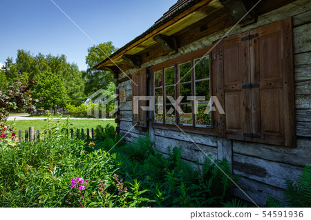 Open-air museum in Chorzow. Wooden cottage in heri 54591936