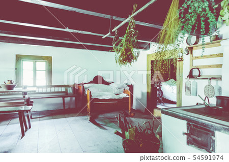 Open-air museum in Chorzow. Interior of wooden cot 54591974