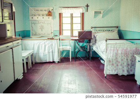 Open-air museum in Chorzow. Interior of wooden cot Open-air museum in Chorzow. Interior of wooden cot 54591977