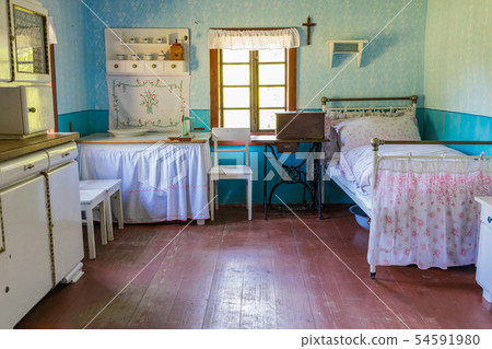 Open-air museum in Chorzow. Interior of wooden cot Open-air museum in Chorzow. Interior of wooden cot 54591980