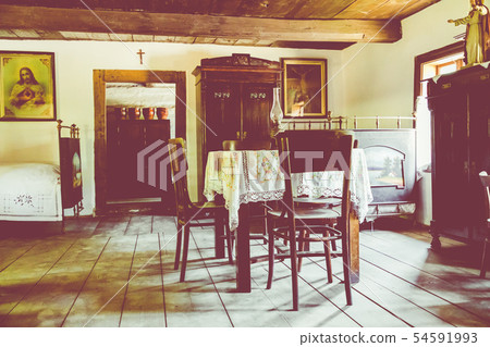 Open-air museum in Chorzow. Interior of wooden cot Open-air museum in Chorzow. Interior of wooden cot 54591993