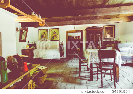 Open-air museum in Chorzow. Interior of wooden cot Open-air museum in Chorzow. Interior of wooden cot 54591994