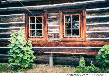 Wooden cottage in heritage park. Open-air museum N 54592032