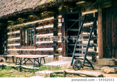 Wooden cottage in heritage park. Open-air museum N 54592033