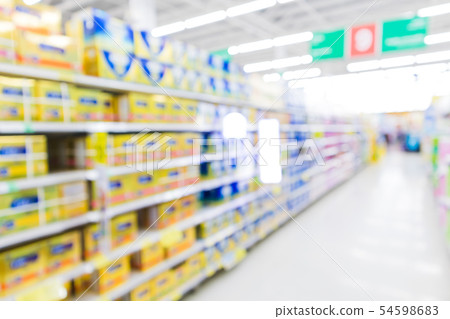 Blur supermarket aisle with baby formula milk Blur supermarket aisle with baby formula milk 54598683