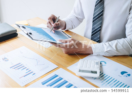 Businessman accountant working analyzing and Businessman accountant working analyzing and 54599911