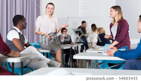 Adult students during recess 54603435