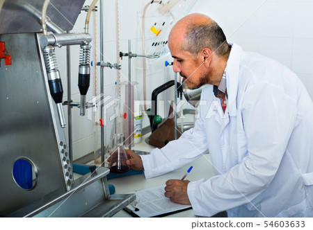 man working with quality tests 54603633