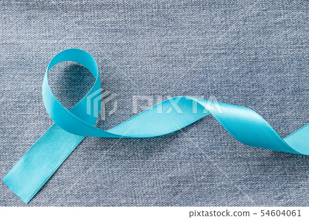 Blue ribbon symbolic of prostate cancer awareness  54604061
