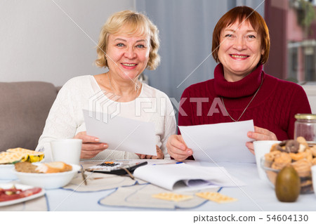 Positive old women with public utilities Positive old women with public utilities 54604130