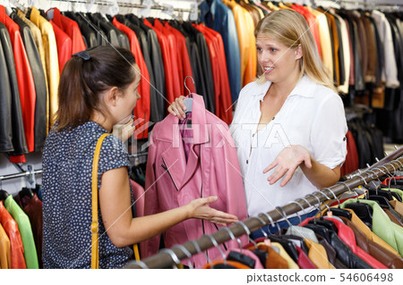 Displeased customer in leather clothes shop Displeased customer in leather clothes shop 54606498