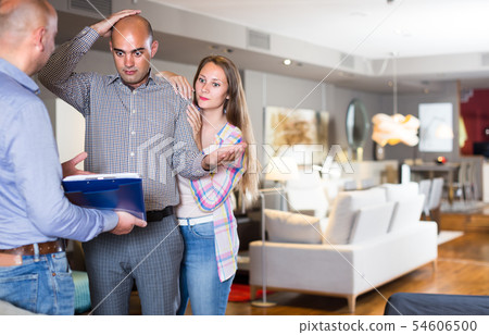Couple is unpleasantly surprised by prices for furniture Couple is unpleasantly surprised by prices for furniture 54606500