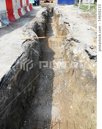 Trenches excavated at the construction site Trenches excavated at the construction site 54608233