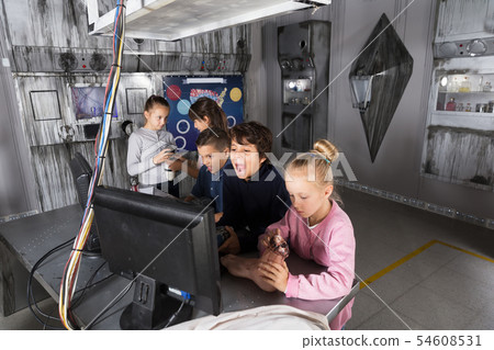 Children playing in bunker questroom 54608531