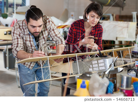 Portrait of happy female and male hobbyists 54608713