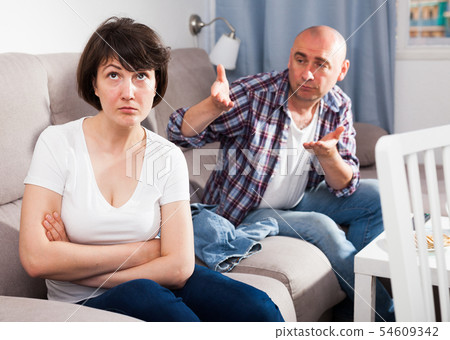 Quarrel between husband and wife in the apartment Quarrel between husband and wife in the apartment 54609342