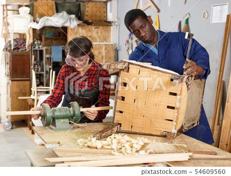 Restoration wooden chair in studio 54609560