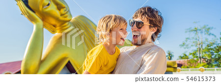 Happy tourists dad and son on background ofLying Buddha statue BANNER, LONG FORMAT 54615373