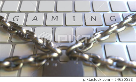 Padlock with chains on the keyboard with GAMING text on keys. Conceptual 3D rendering Padlock with chains on the keyboard with GAMING text on keys. Conceptual 3D rendering 54620558