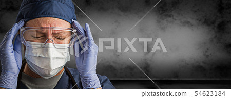 Female Doctor or Nurse in Goggles, Surgical Mask Female Doctor or Nurse in Goggles, Surgical Mask 54623184