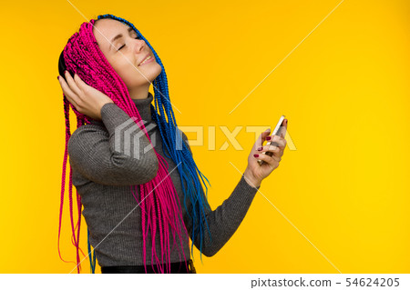 Happy cheerful woman with senegalese braids Happy cheerful woman with senegalese braids 54624205
