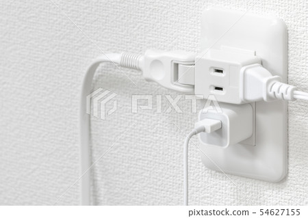 Outlet with many cables connected 54627155