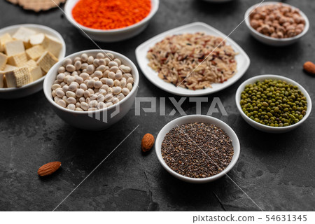 Healthy vegan food on a concrete background Healthy vegan food on a concrete background 54631345