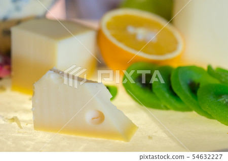 different kinds of cheese with fresh fruits on 54632227