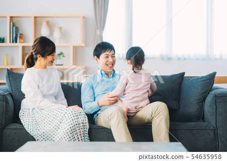 Living room young family 54635958