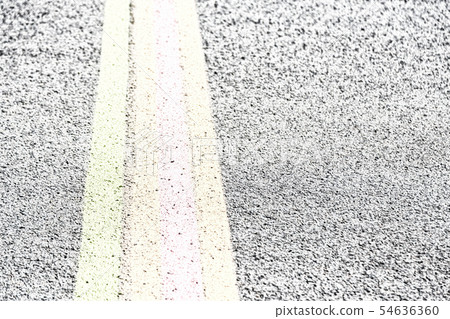 the line in the asphalt of an airport floor 54636360